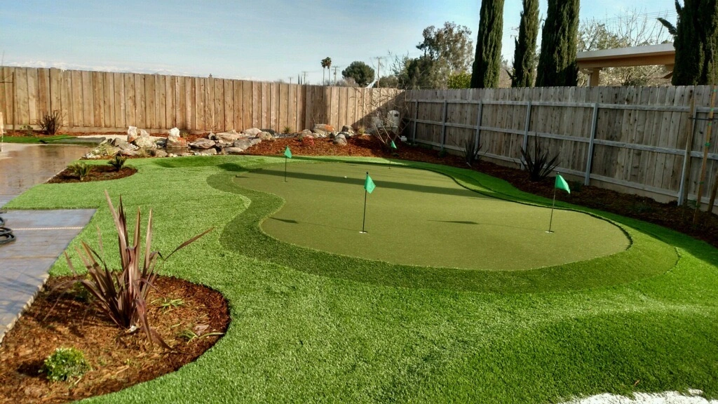 Custom backyard pool deck with pavers in San Diego